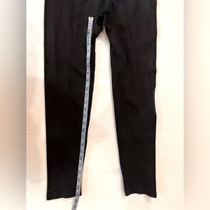 Dressy stretch pants. Black. Never worn.